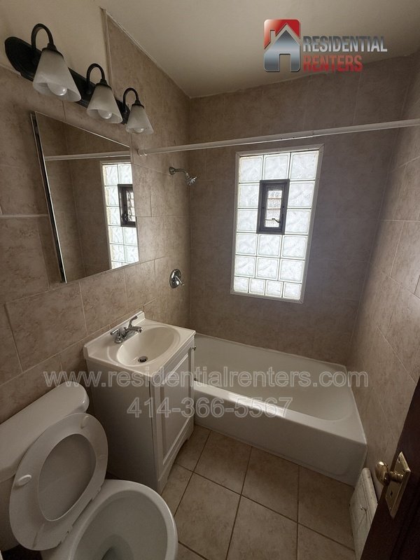 Spacious lower unit with hardwood floors, tile in bathroom and Garage parking. property image