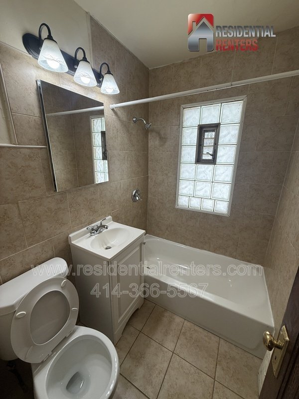 Spacious lower unit with hardwood floors, tile in bathroom and Garage parking. property image