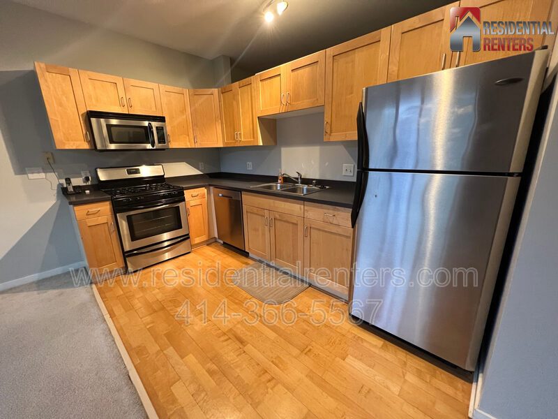 Desirable Commerce St Condo Living, Heated Garage Parking Included, Pets Welcome. property image