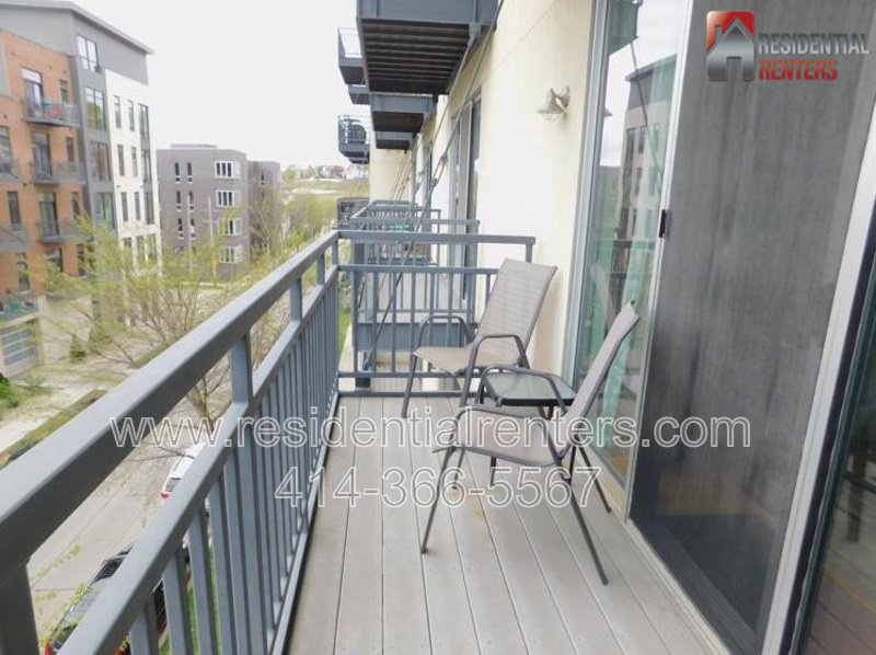 Desirable Commerce St Condo Living, Heated Garage Parking Included, Pets Welcome. property image