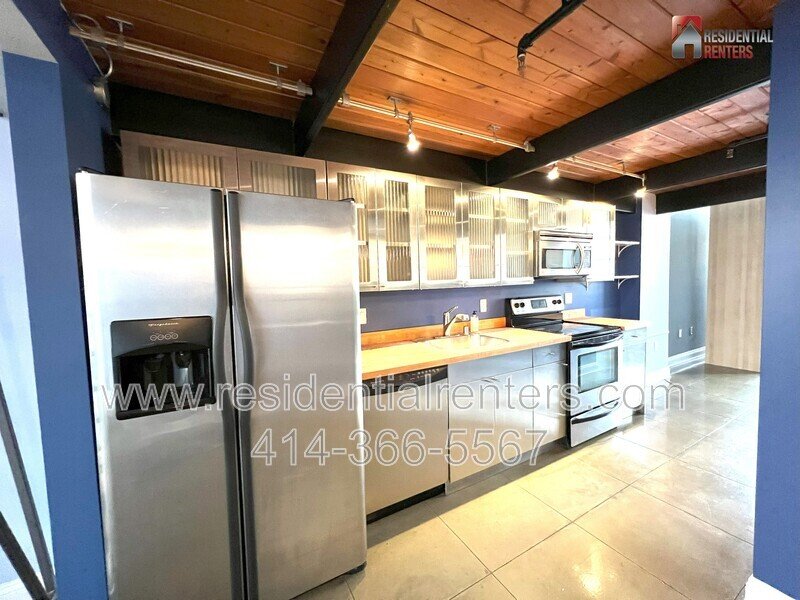 Rare Open Concept Riverwest Loft, Garage Parking Included, Cream City Brick, Pet Friendly! property image