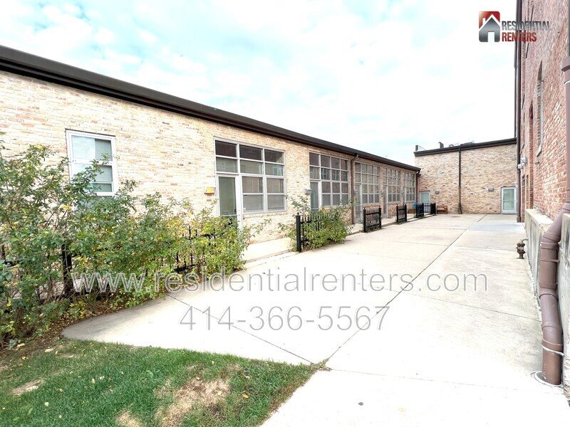 Rare Open Concept Riverwest Loft, Garage Parking Included, Cream City Brick, Pet Friendly! property image