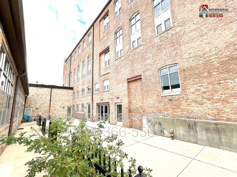 Rare Open Concept Riverwest Loft, Garage Parking Included, Cream City Brick, Pet Friendly! property image