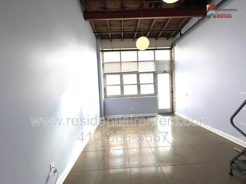 Rare Open Concept Riverwest Loft, Garage Parking Included, Cream City Brick, Pet Friendly! property image