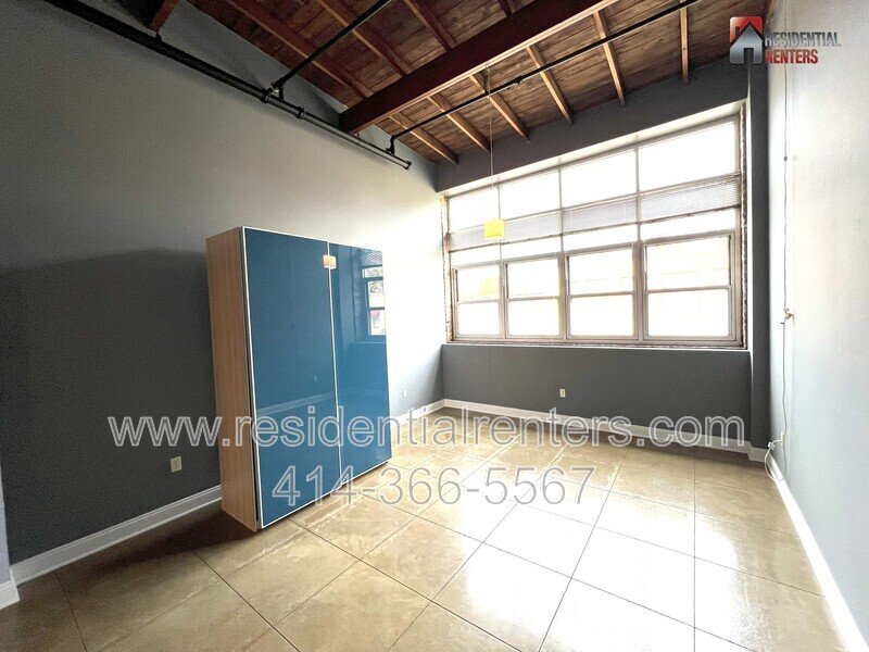 Rare Open Concept Riverwest Loft, Garage Parking Included, Cream City Brick, Pet Friendly! property image