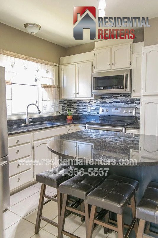 Spacious 4-Bedroom Home with Garage, Off-Street Parking & On-Site Laundry property image