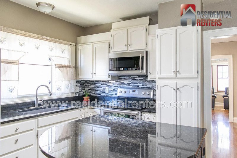 Spacious 4-Bedroom Home with Garage, Off-Street Parking & On-Site Laundry property image