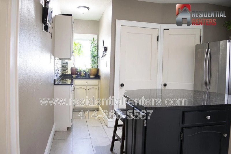 Spacious 4-Bedroom Home with Garage, Off-Street Parking & On-Site Laundry property image