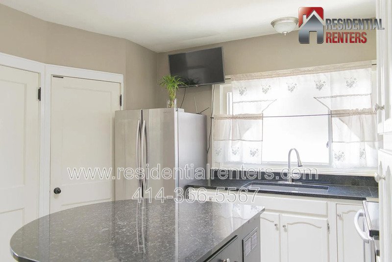 Spacious 4-Bedroom Home with Garage, Off-Street Parking & On-Site Laundry property image