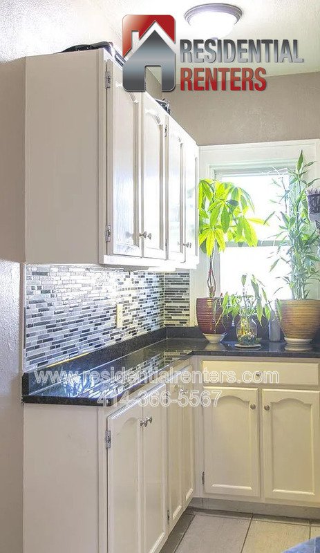 Spacious 4-Bedroom Home with Garage, Off-Street Parking & On-Site Laundry property image