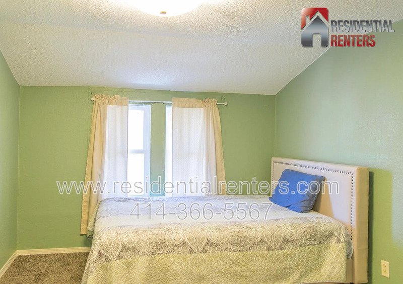 Spacious 4-Bedroom Home with Garage, Off-Street Parking & On-Site Laundry property image