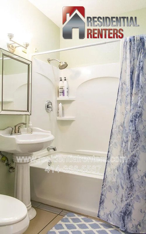 Spacious 4-Bedroom Home with Garage, Off-Street Parking & On-Site Laundry property image
