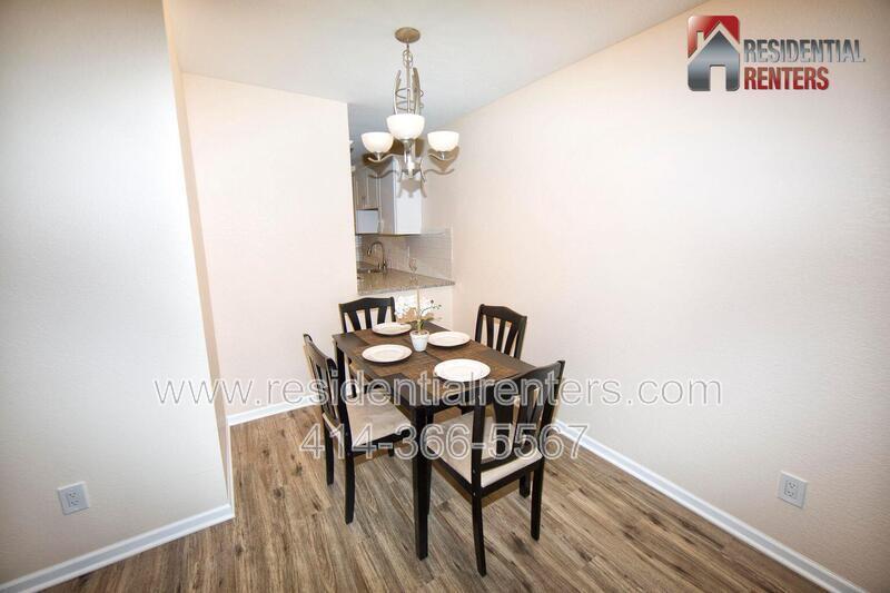 Spacious 2-Bedroom Condo with River Views, Pool & Heated Garage. Great Location! property image