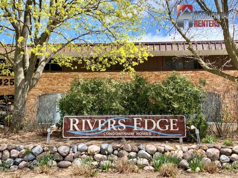 Spacious 2-Bedroom Condo with River Views, Pool & Heated Garage. Great Location! property image