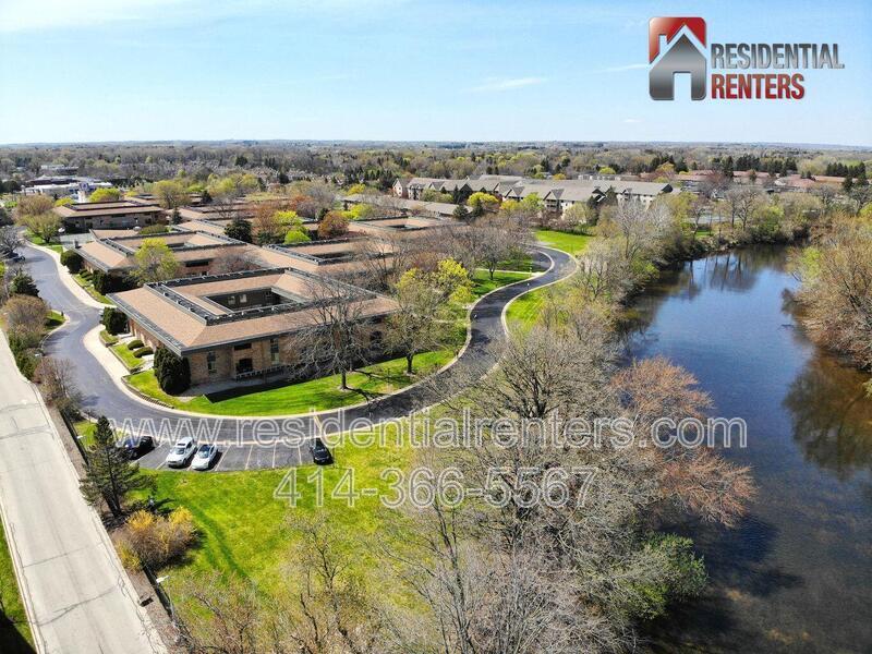 Spacious 2-Bedroom Condo with River Views, Pool & Heated Garage. Great Location! property image