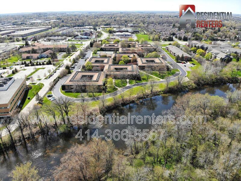 Spacious 2-Bedroom Condo with River Views, Pool & Heated Garage. Great Location! property image