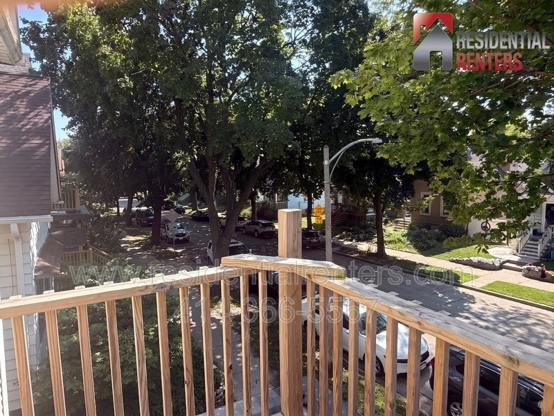 Riverwest 3BR Upper Duplex, Private Balcony, Yard & 2 Off-Street Parking Spaces! property image