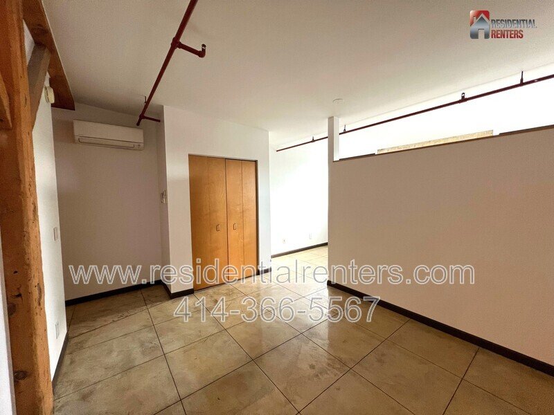 Rare Western Leather Lofts Studio, Cream City Brick, Exposed Timber Beams, Radiant Heated Flooring. property image