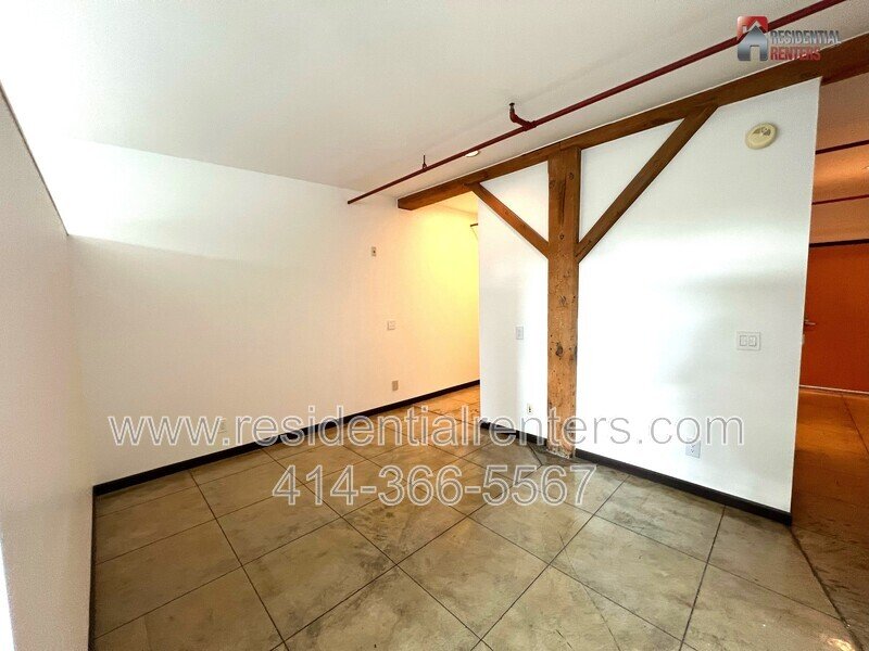 Rare Western Leather Lofts Studio, Cream City Brick, Exposed Timber Beams, Radiant Heated Flooring. property image