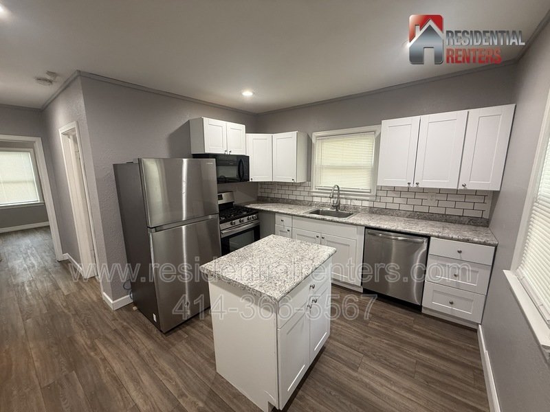 Charming fully updated single family home in Butler featuring a modern kitchen with stainless steel appliances, stylish finishes, and spacious living areas. property image